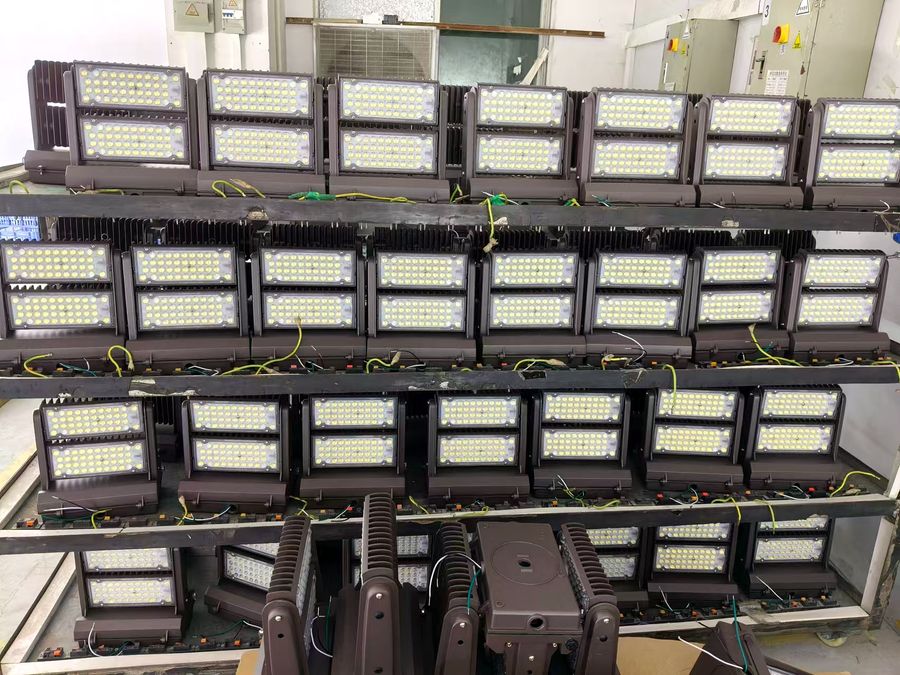 LED flood light modules on aging test racks LED flood light modules on aging test racks